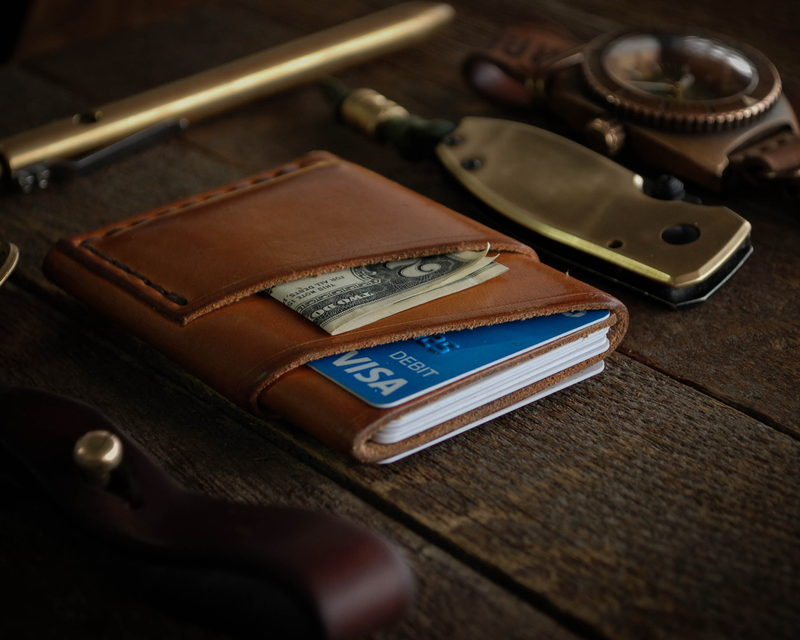Discover the story behind the Port Wallet, a handcrafted leather wallet known for its quality, utility, and timeless aesthetic. Learn why it continues to be a favorite among everyday carry enthusiasts.