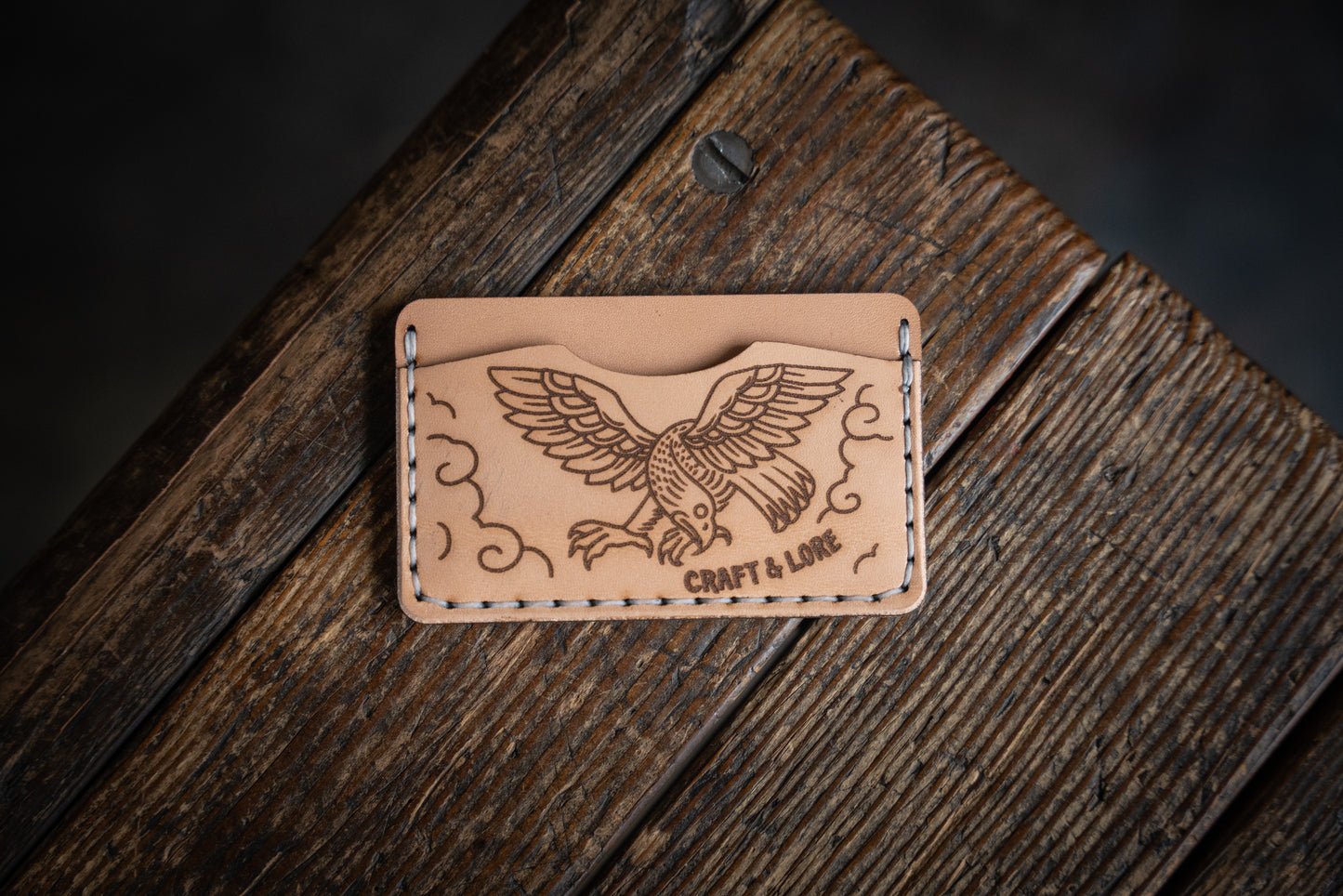 leather wallet with traditional eagle tattoo design 